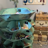 Our famous junk rack is just waiting for you to find treasures! Everything from buttons, matchbooks, patches, trophy toppers, and super cheap jewelry!